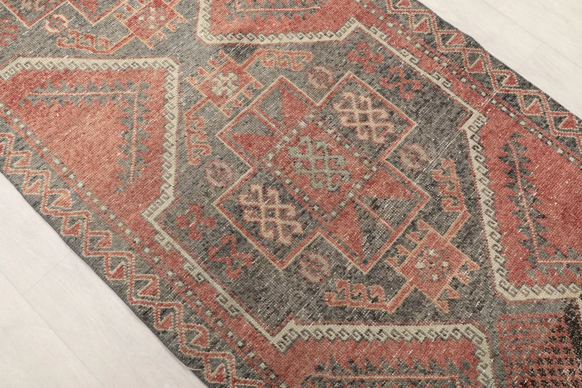 Angled view highlighting the central geometric patterns and color variations