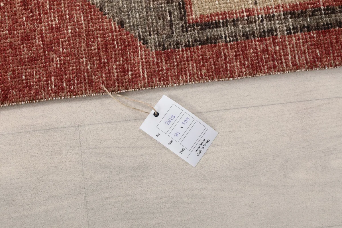 Label attached to the rug, indicating product details and origin