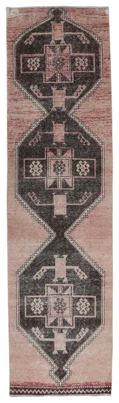 Full top view of a 3'4" x 12'5" rose and charcoal geometric runner rug on a white background.