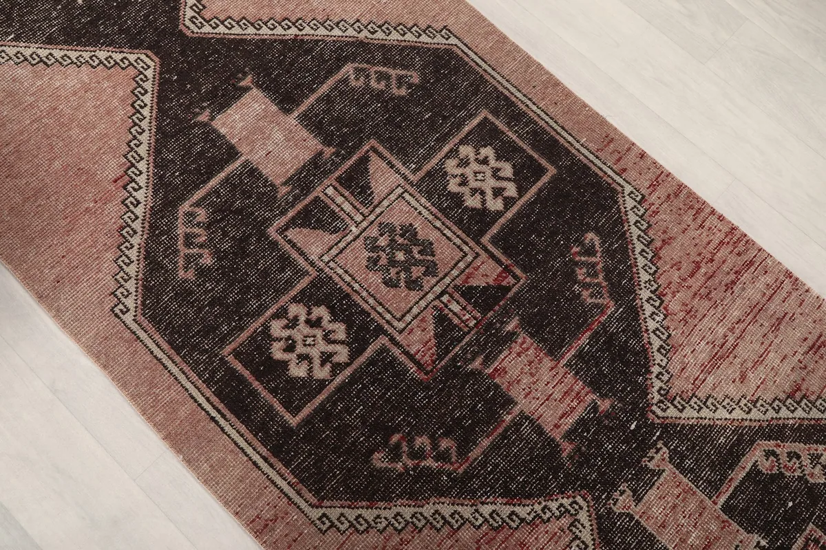 Overhead angle showing the repeating geometric pattern and color variations in the runner.