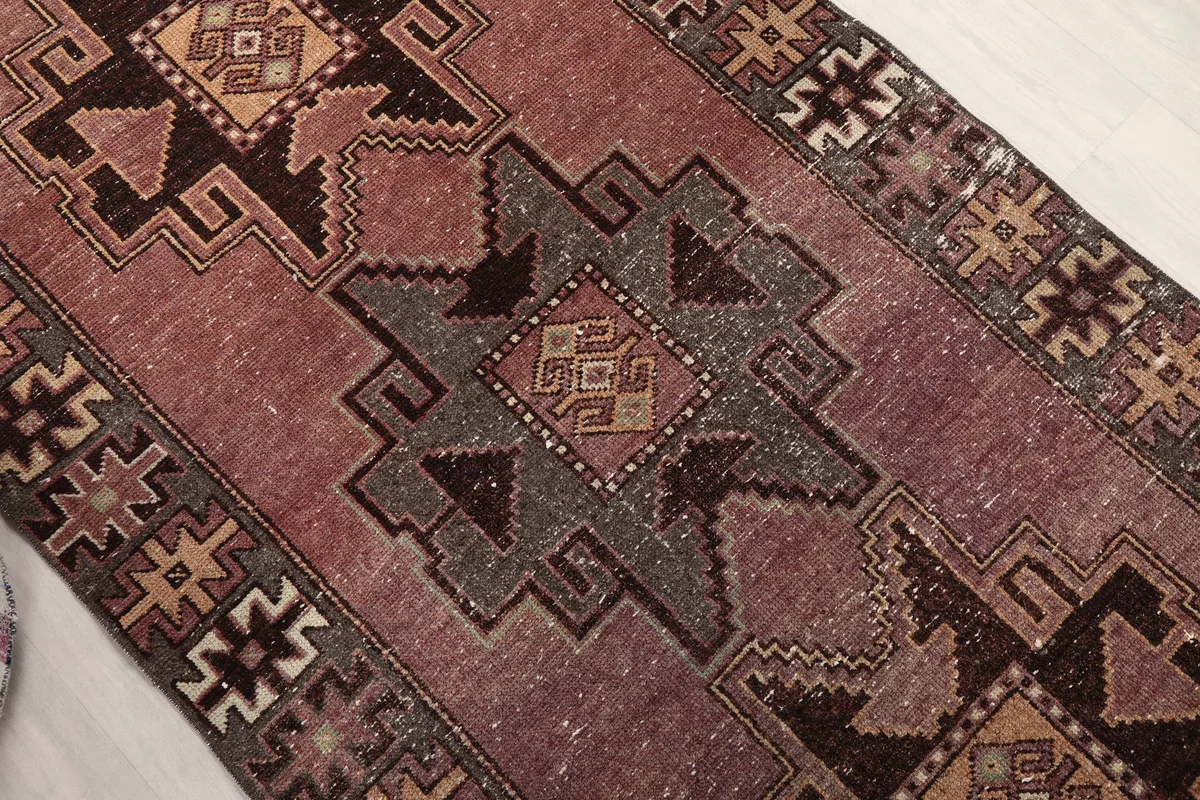 Close-up of a central geometric medallion on the Rose Geometric Anatolian Runner