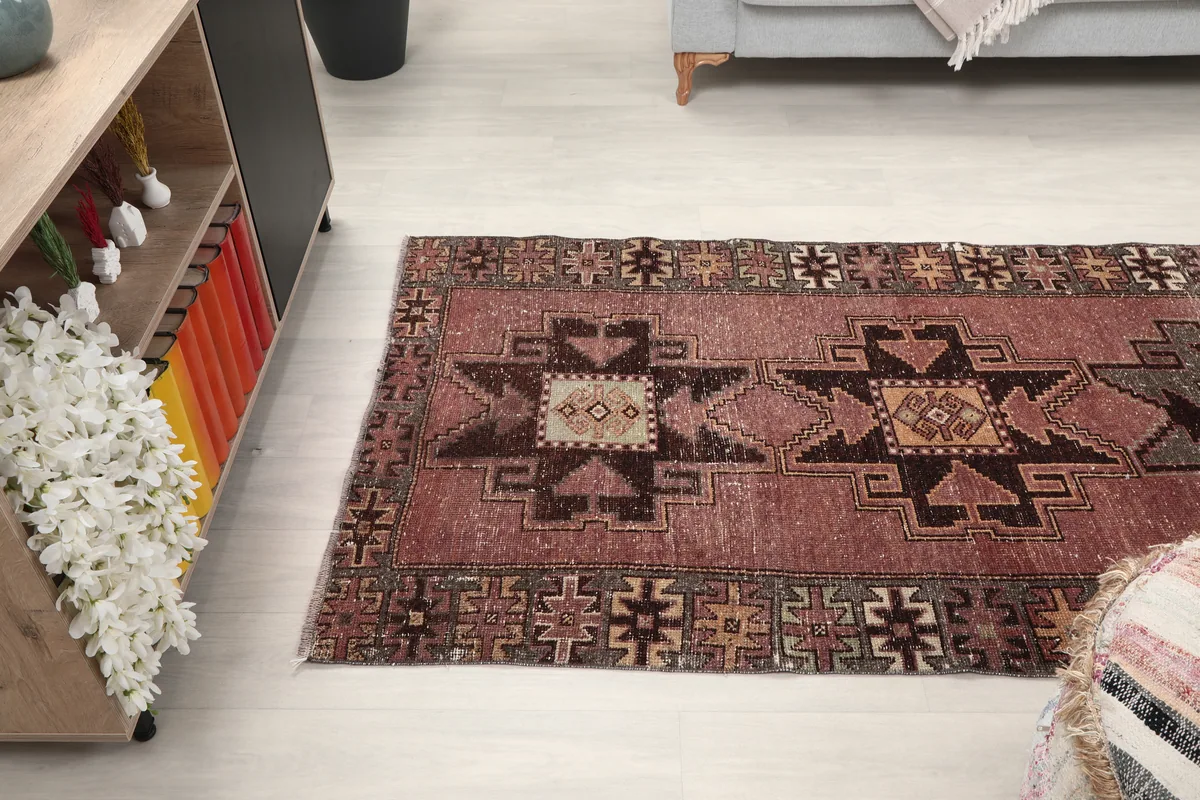 Rose Geometric Anatolian Runner in a room, showing its length and placement