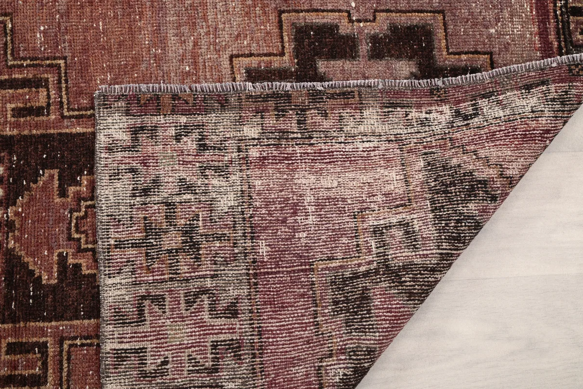 Backside detail of the Rose Geometric Anatolian Runner, revealing hand-knotted construction