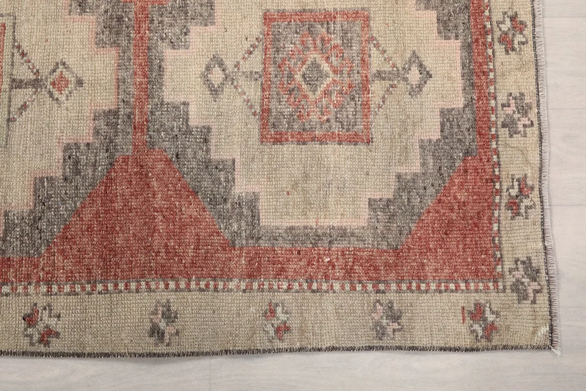 Detailed view of the corner motif and border design on the Anatolian runner