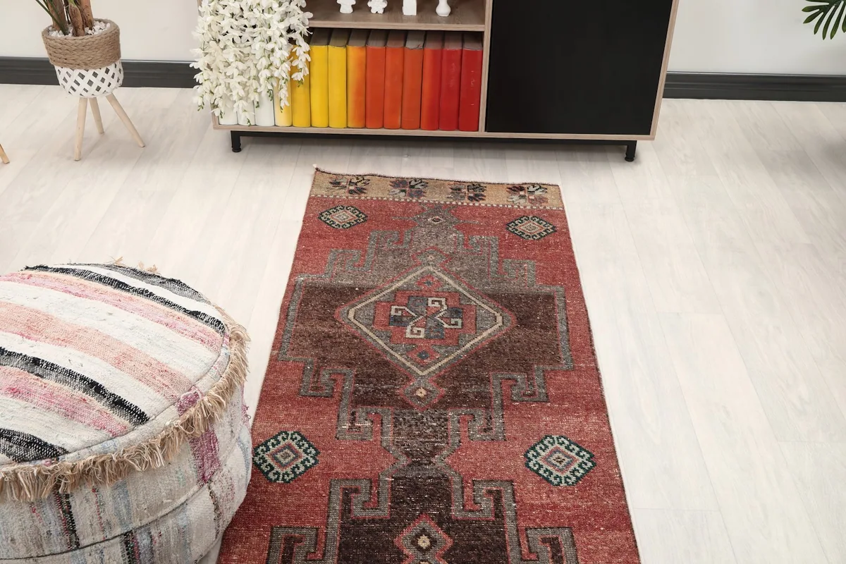 Overhead view of the runner rug in a room, showing its placement relative to furniture.