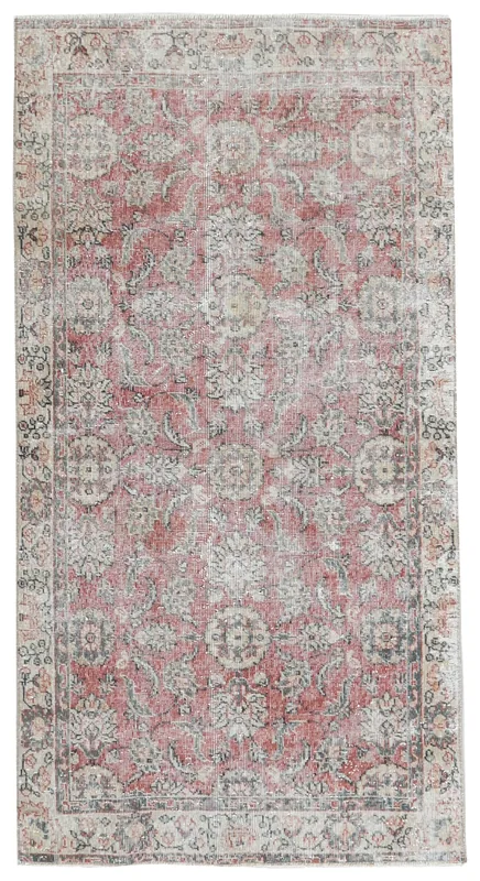Full overhead view of the hand-knotted rose floral medallion vintage rug
