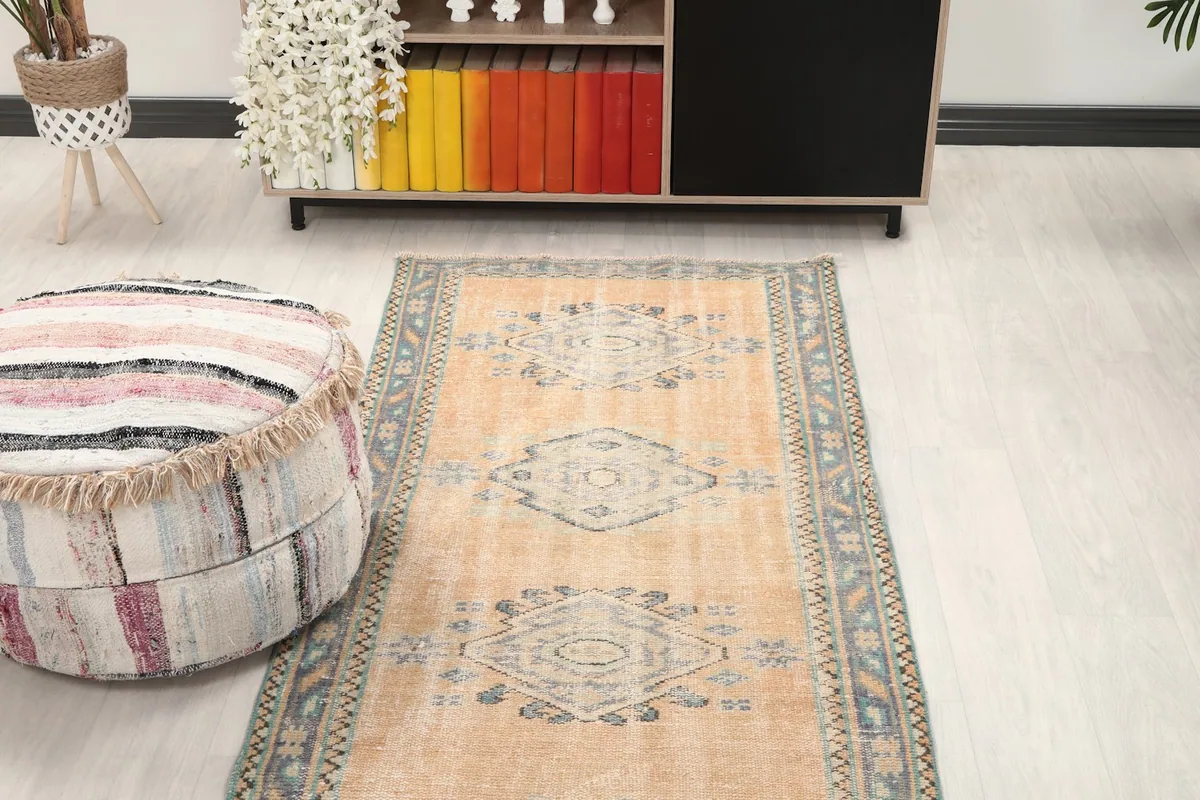 Overhead view of the runner rug in a room, emphasizing its long, narrow shape and how it defines the space.