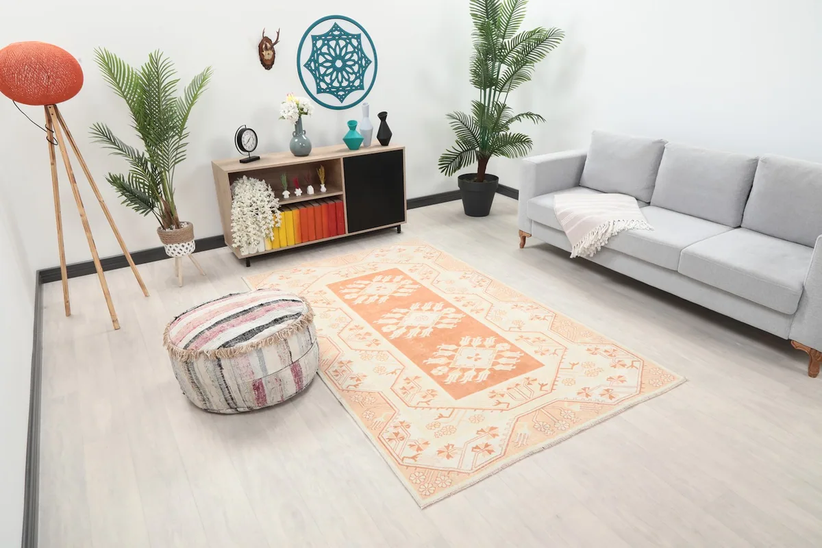 Overhead view of the rug in a living room, highlighting its placement and the overall room decor.