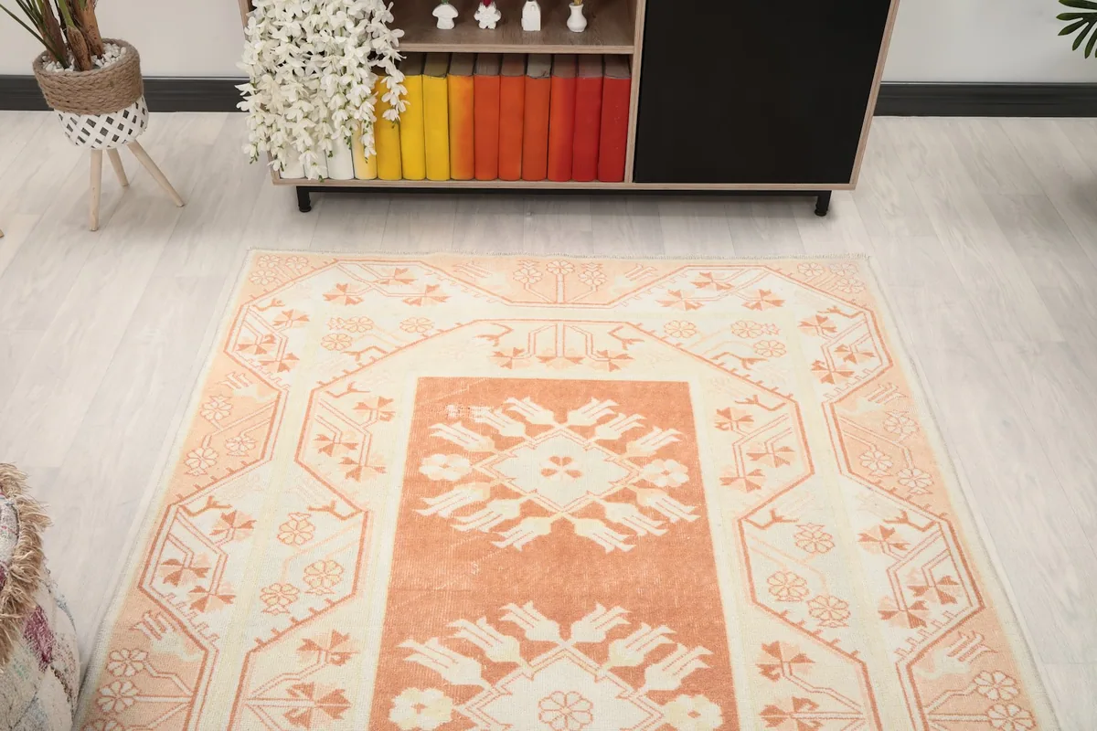 Overhead shot of the rug in a room setting, providing a clear view of its full design.