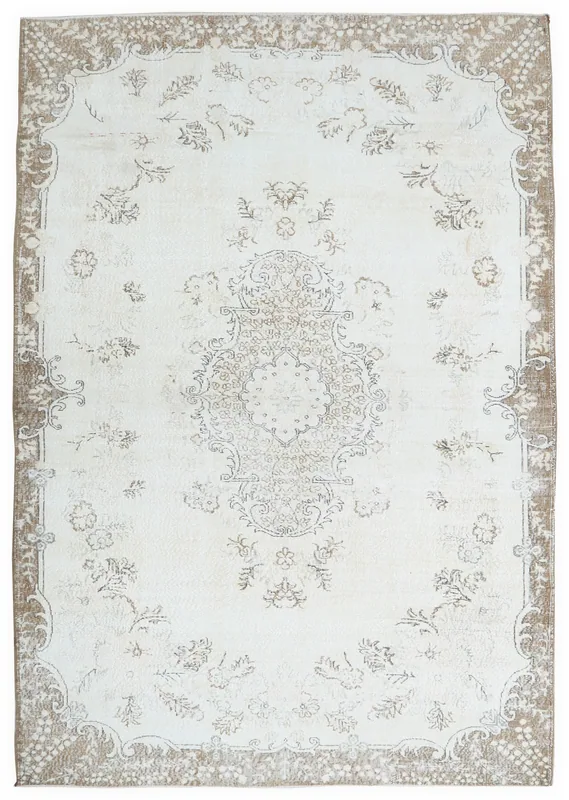 Full top view of the 7'3" x 10'9" ivory and tan vintage Anatolian area rug