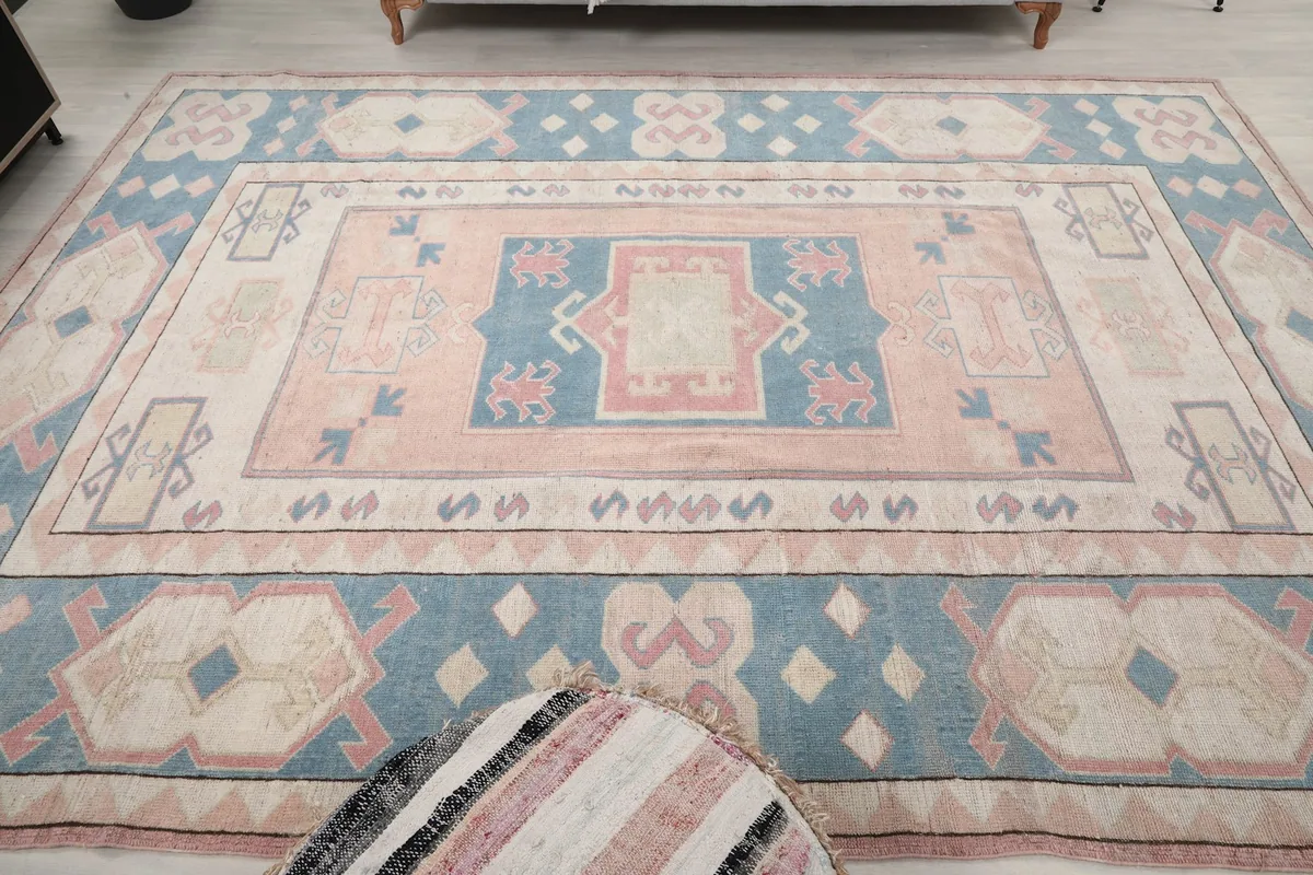 Overhead view of the rug in a room, offering a clear perspective of the overall pattern