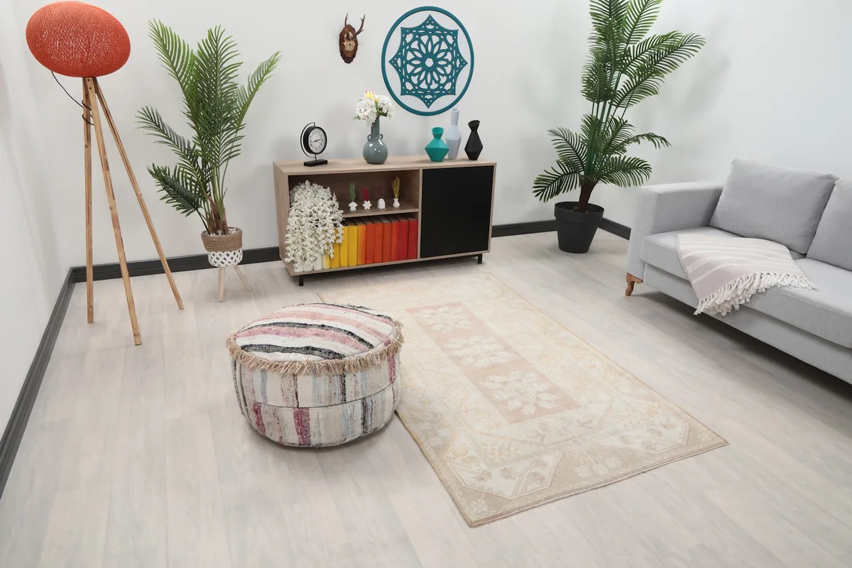 Angle view of the rug in a living room, showing its placement relative to furniture