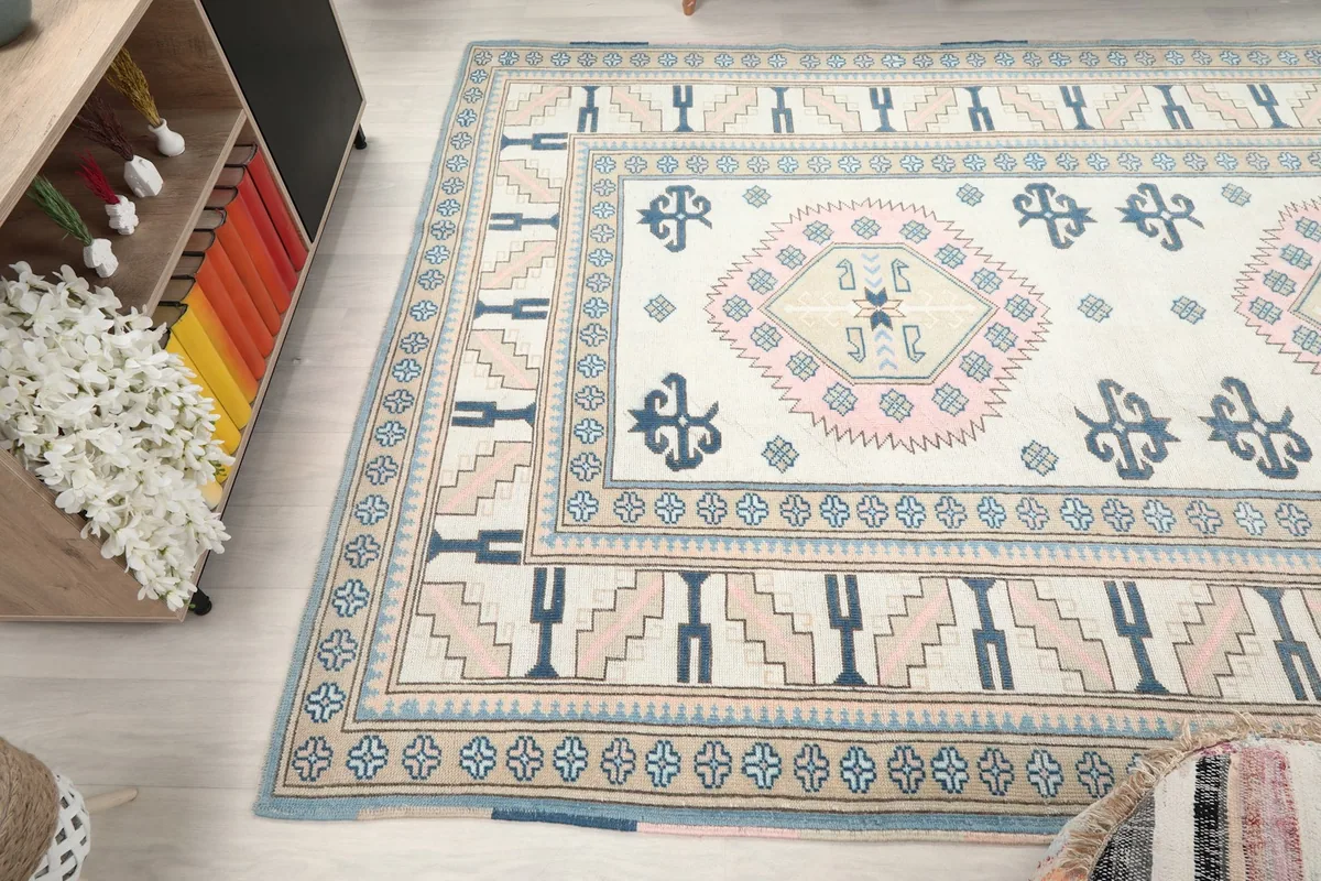 View of the rug from another angle, capturing its texture and color variations