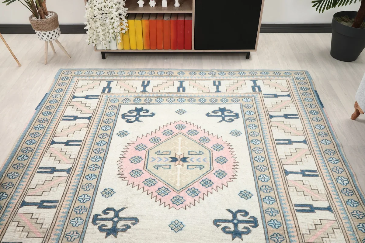 View of the rug in a room, focusing on its full length and patterns from a distance