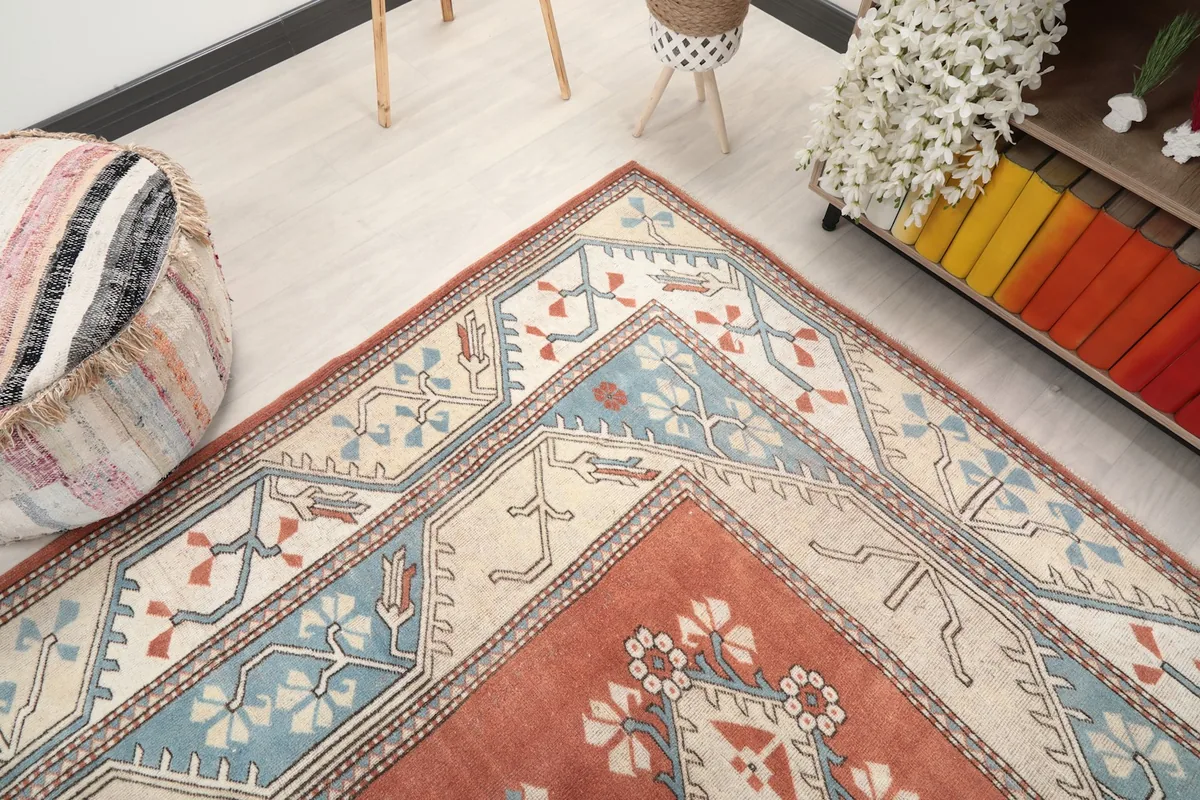 Corner view of the rug showing the intricate border and field patterns