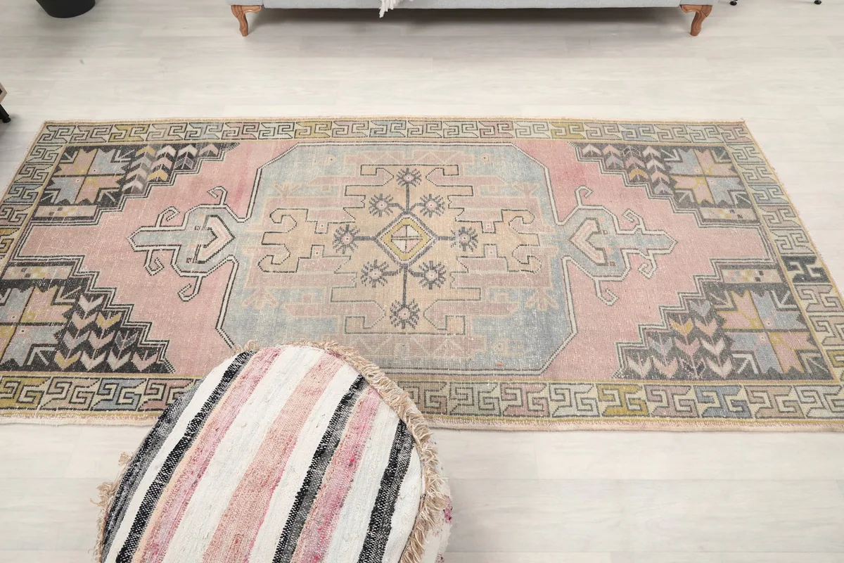 Overhead view of the vintage Anatolian runner, emphasizing its overall design and color palette