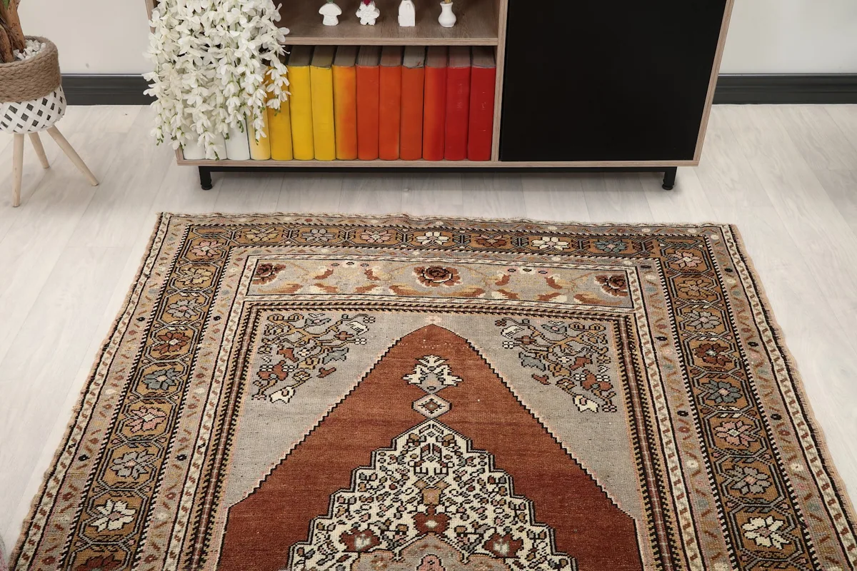 Overhead view of the rug's upper section, displaying the border and part of the main field