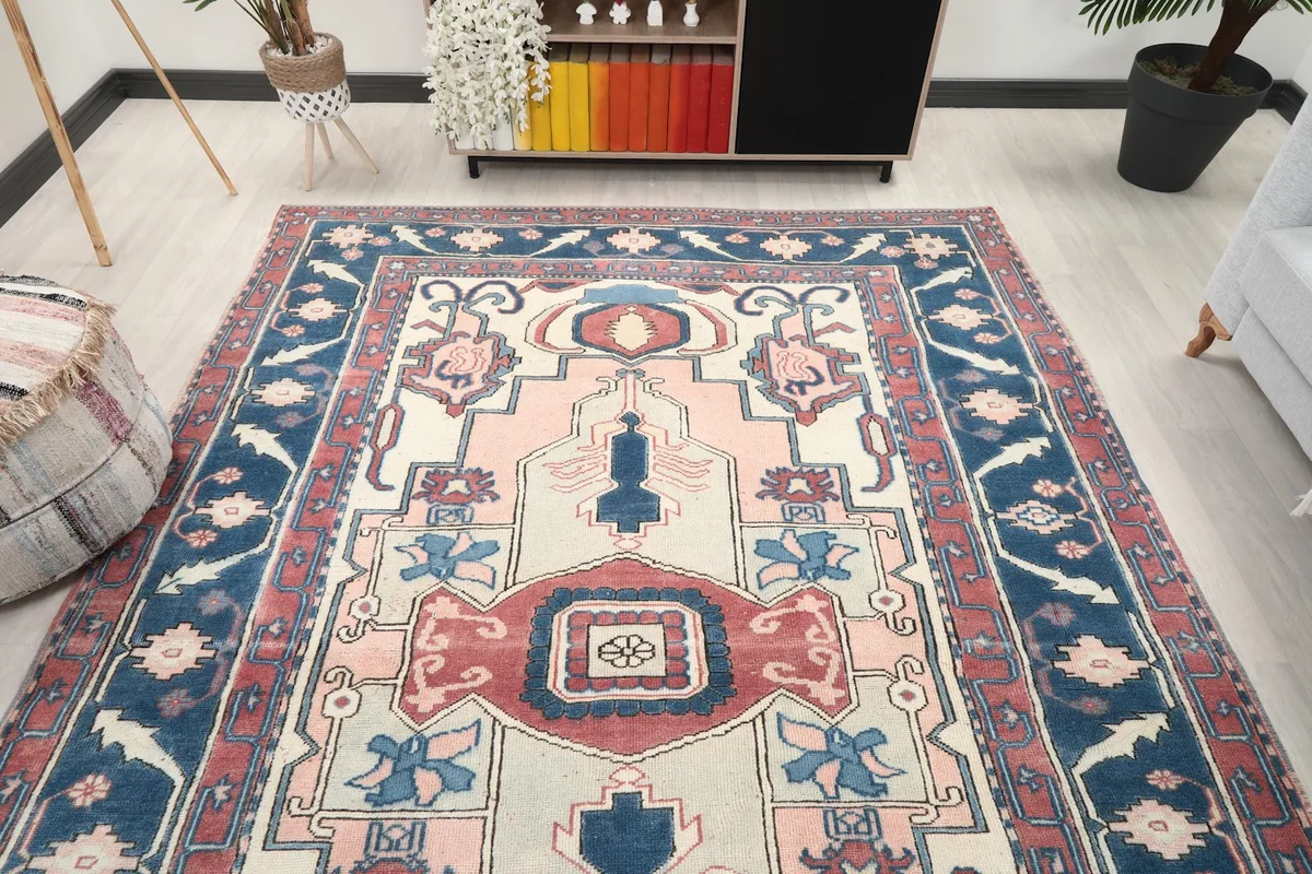 Overhead view of the rug in a room, highlighting its full pattern and colors