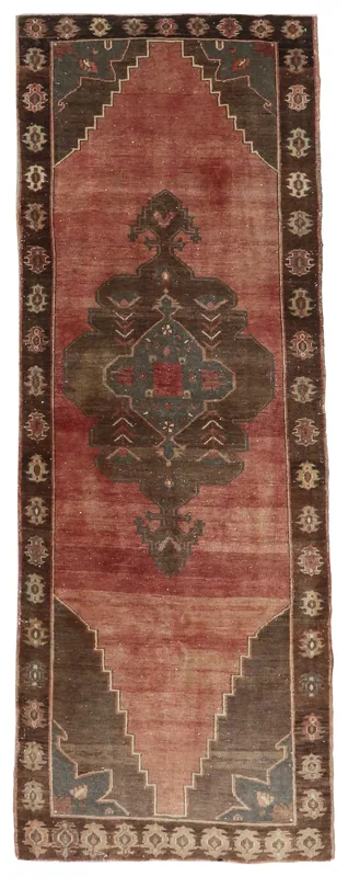 Full top view of the rust and brown vintage Anatolian runner rug.