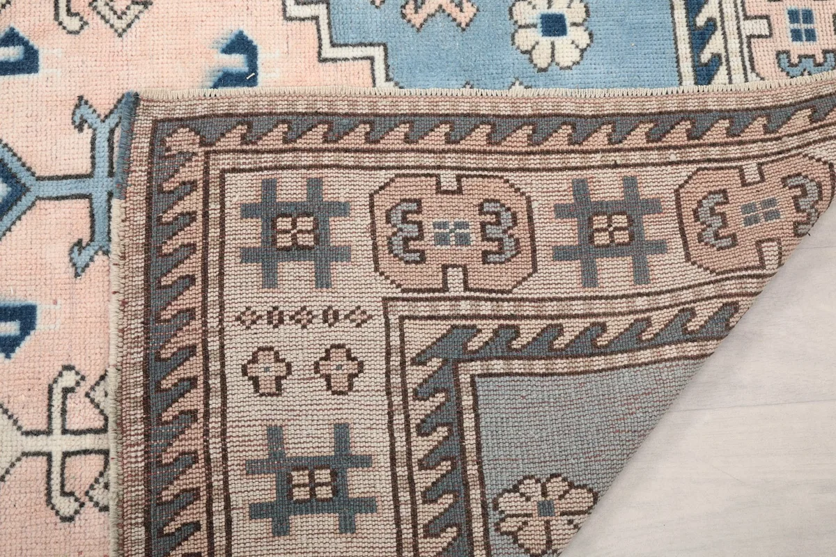 Close-up of the rug's back, showing the consistent knotting and structure