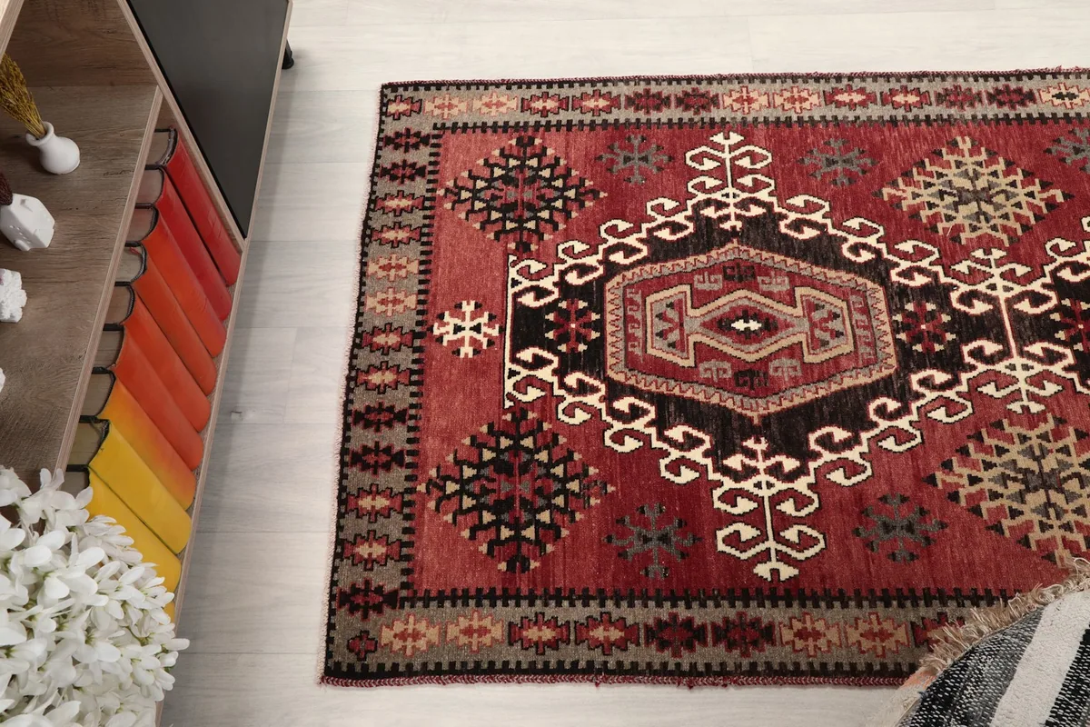 Overhead angle showing the rug's full design and colors in a room setting