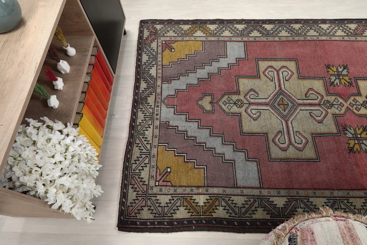 High-angle view of the rug from the side, revealing its full length and design elements