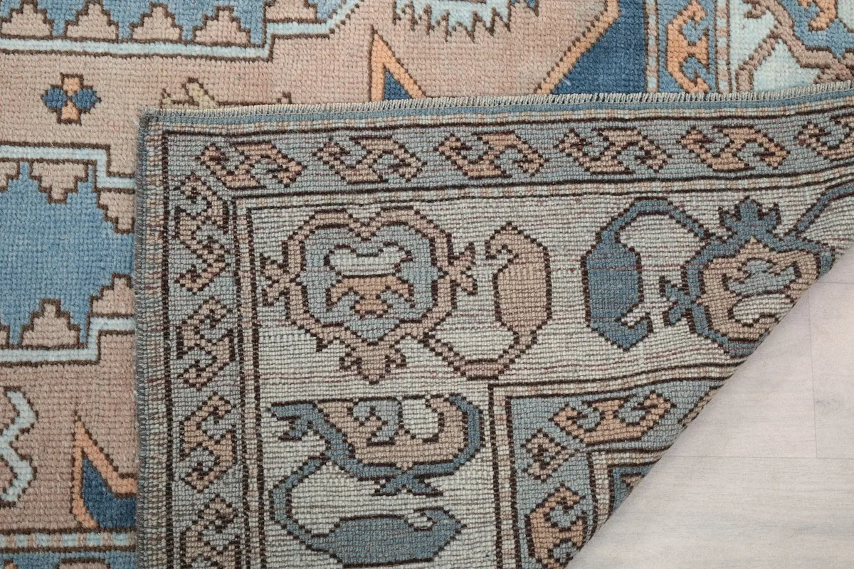 Close-up of the rug's reverse side, revealing the tight knotting and craftsmanship.