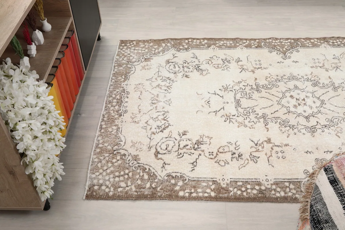Angled shot of the rug from another side, showing its placement and design elements