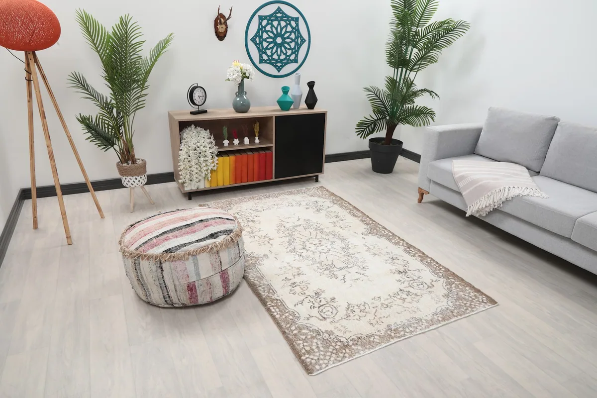 Overhead view of the rug in a living room, showing its size relative to furniture
