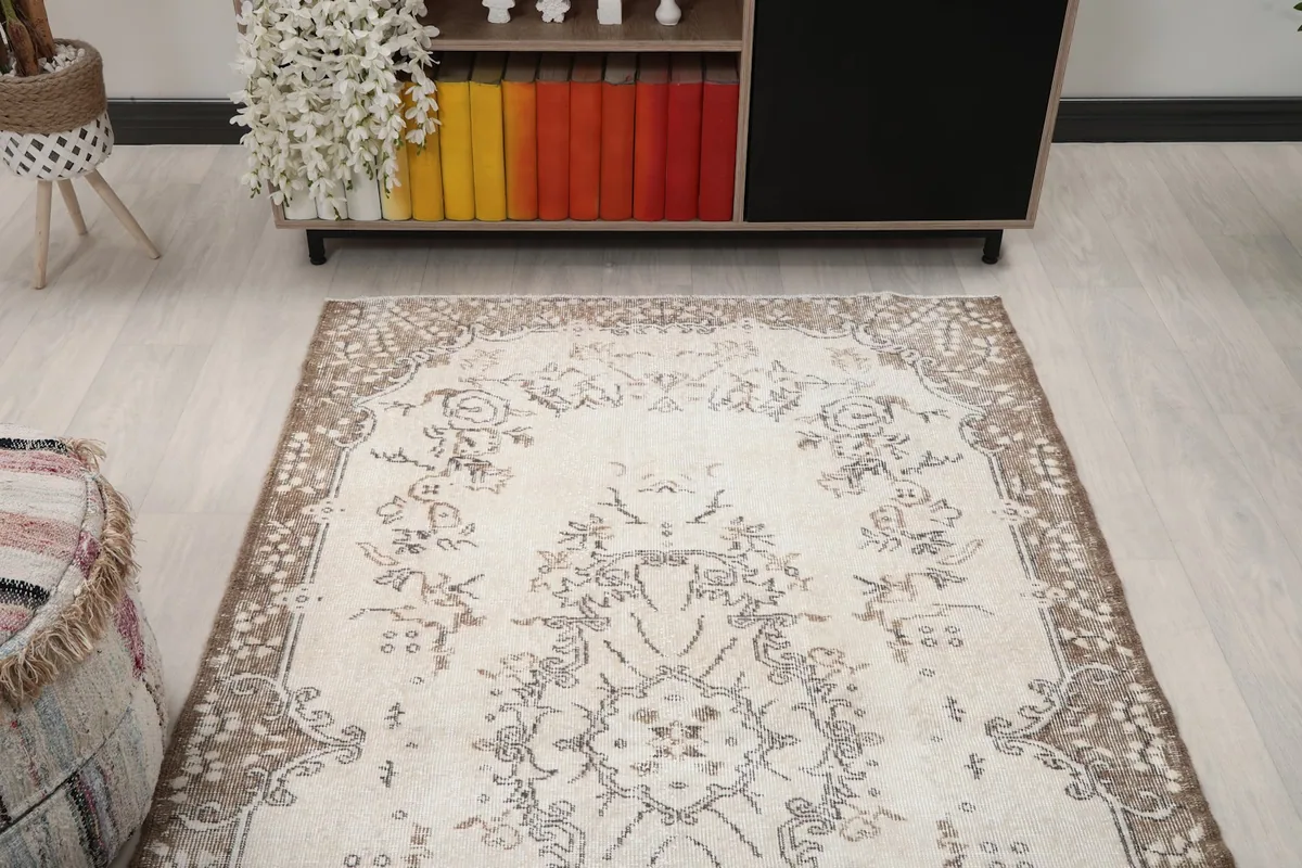 Overhead perspective of the rug showcasing its full pattern and color distribution in a room