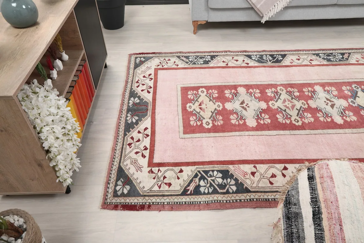 Wide angle view of the rug in a living room setup from a different perspective