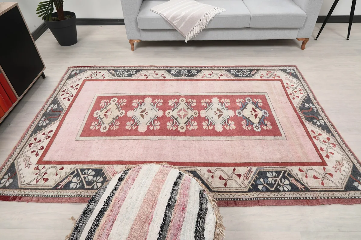 Overhead shot of the rug in a room, showcasing its medium size and design