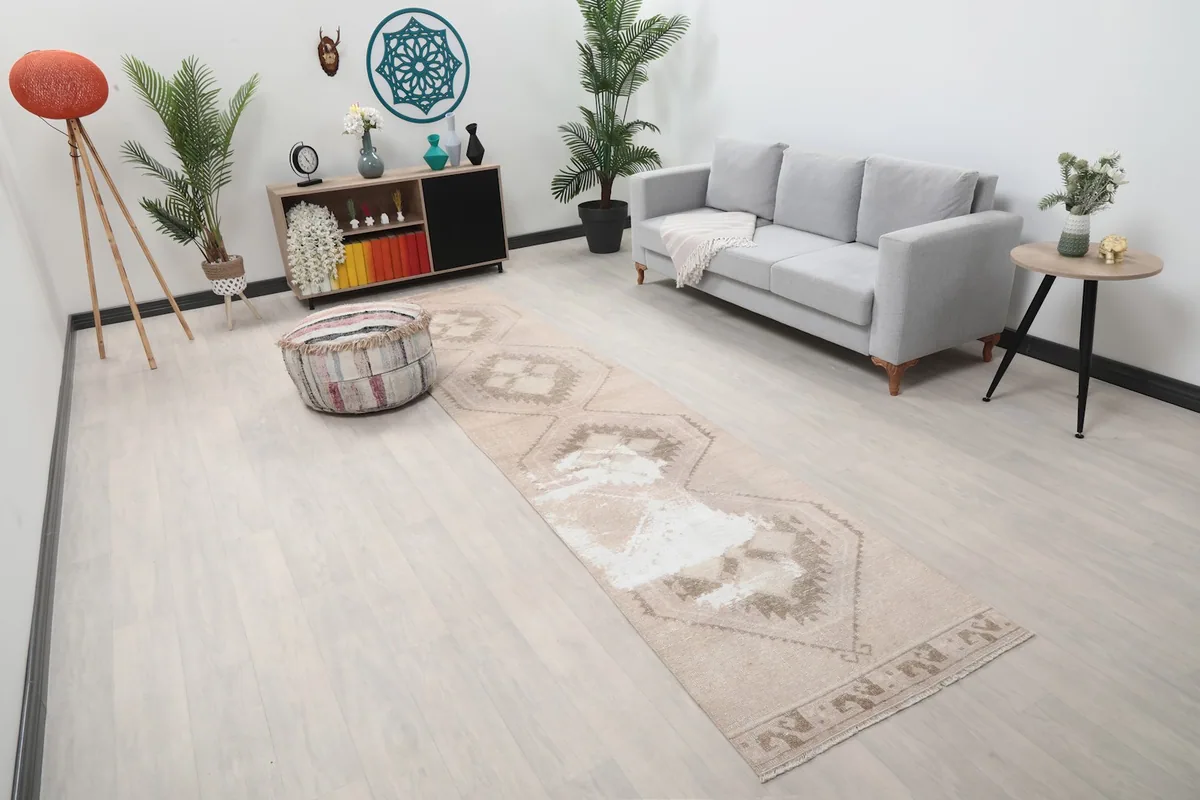 Angle view of the runner rug in a room, showing its length and pattern
