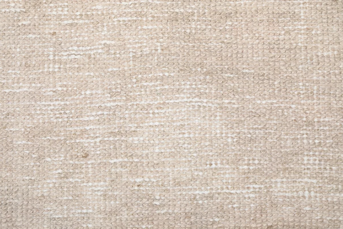 Extreme close-up of the Beige Distressed Anatolian Runner's wool pile, showing individual fibers and texture.