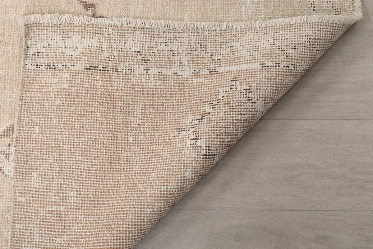Another view of the back of the rug, showing the consistent knotting and material