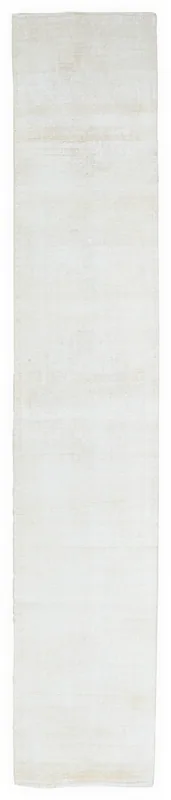 Full overhead view of the beige vintage Anatolian wool runner rug on a white background.