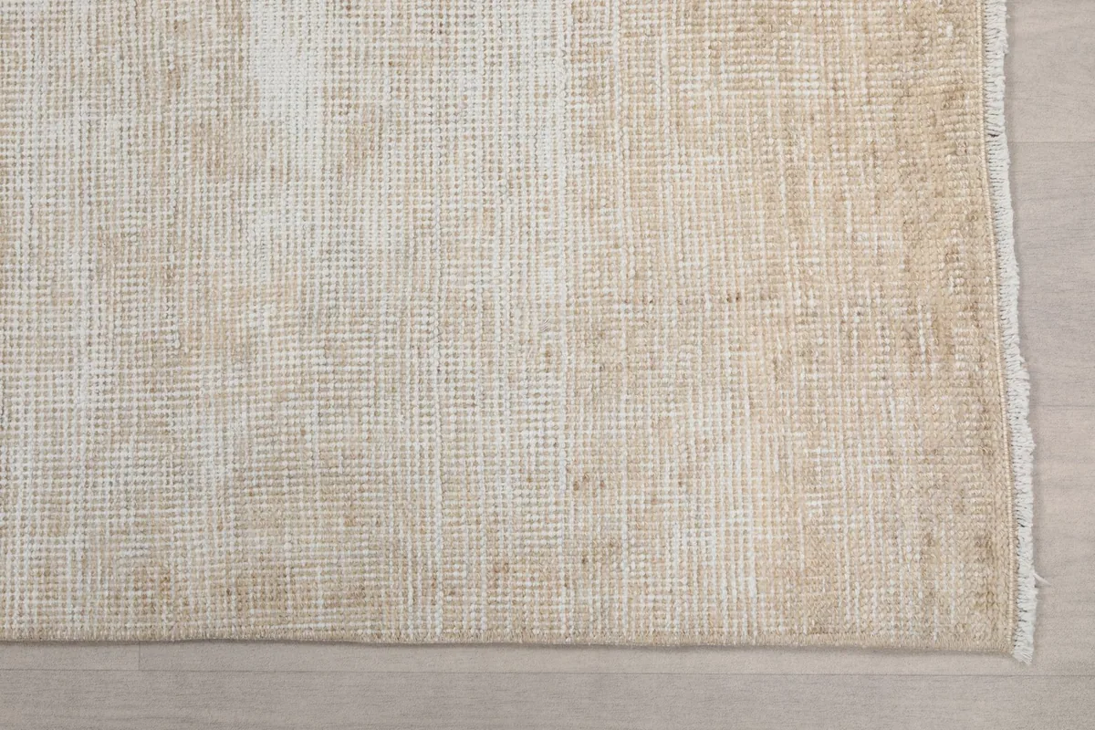 Detailed view of the low wool pile and texture of the vintage Anatolian runner rug