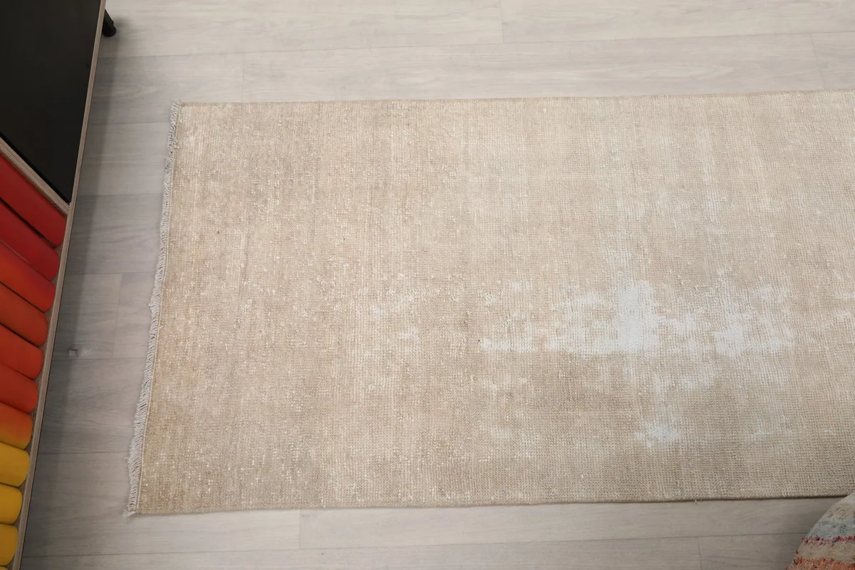 Overhead shot of a portion of the runner rug, emphasizing its length and color