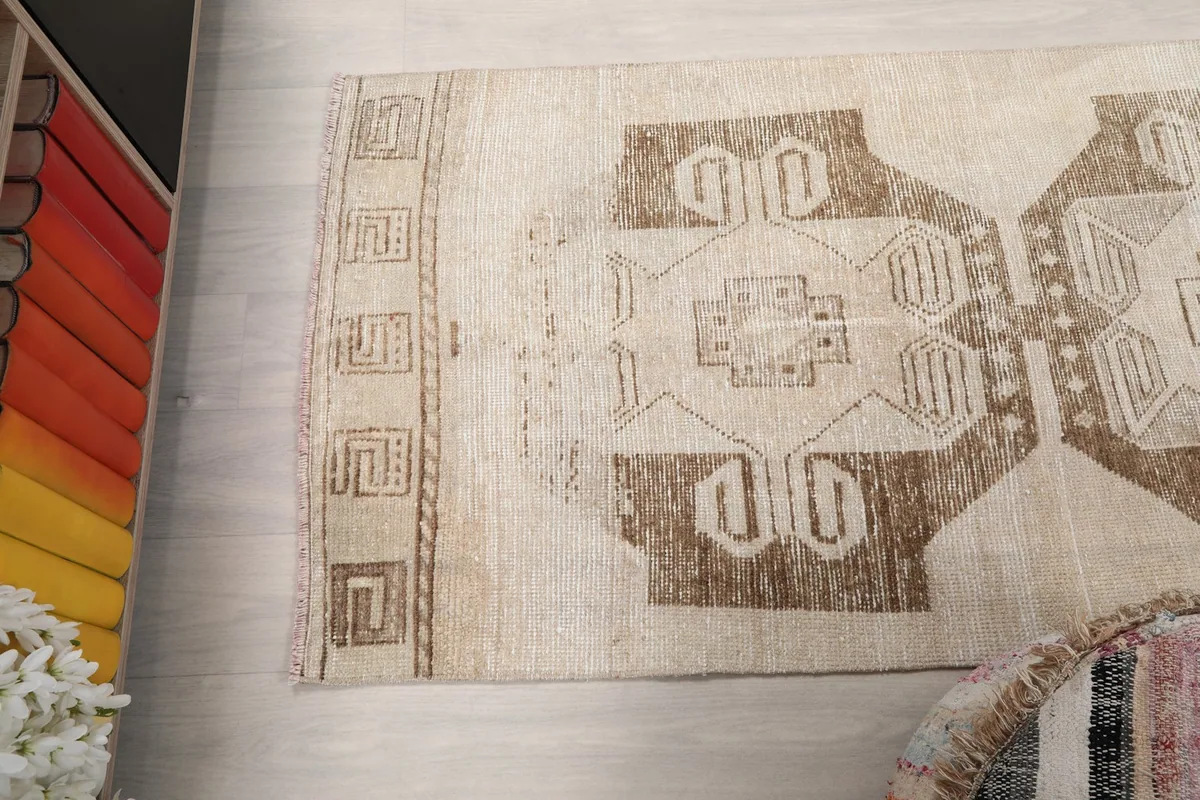 Angle shot looking down the length of the runner, emphasizing the repeated geometric patterns.
