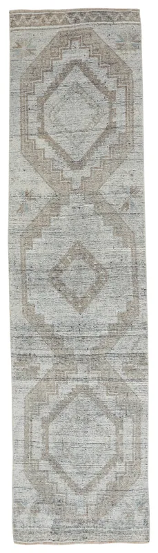 Full top view of the 2'11" x 10'7" beige and gray geometric Anatolian runner on a white background.