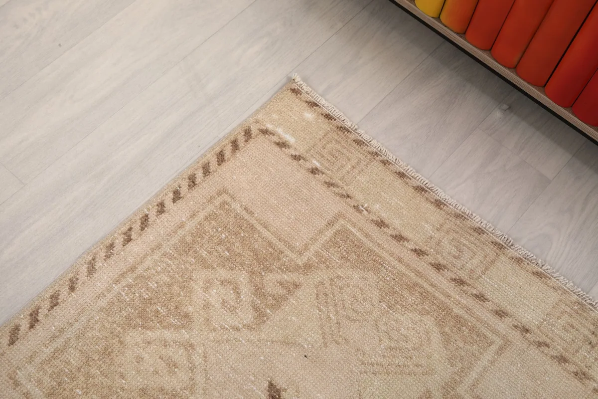 Close-up of the woven border and edge detailing of the vintage Anatolian runner