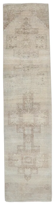 Full overhead view of the beige and brown geometric vintage Anatolian runner rug