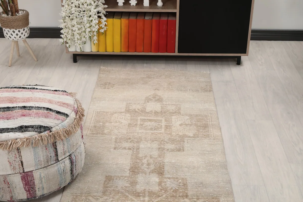 View of the rug's pattern and colors from a different angle in the room setting