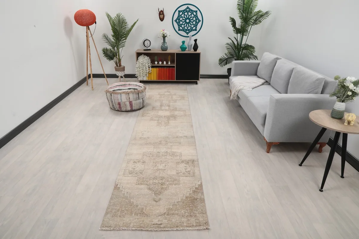 Runner rug placed in a modern living room setting, showing its length and scale