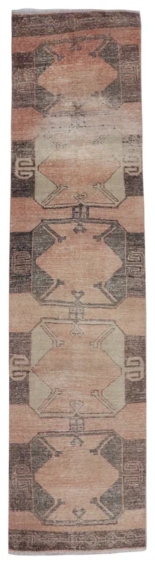 Full top view of the 2'11" x 12'4" vintage Anatolian runner rug with rust and brown geometric patterns