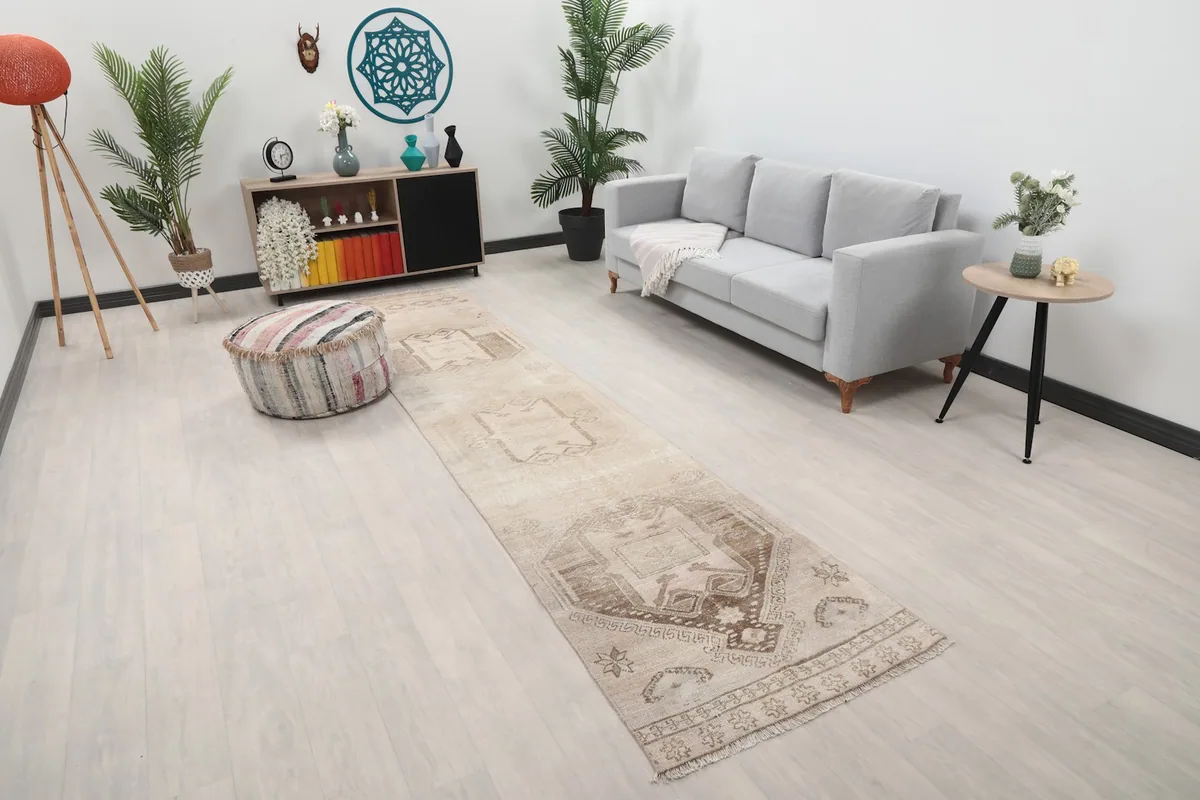Angled view of the Anatolian runner rug in a room with a sofa and decor
