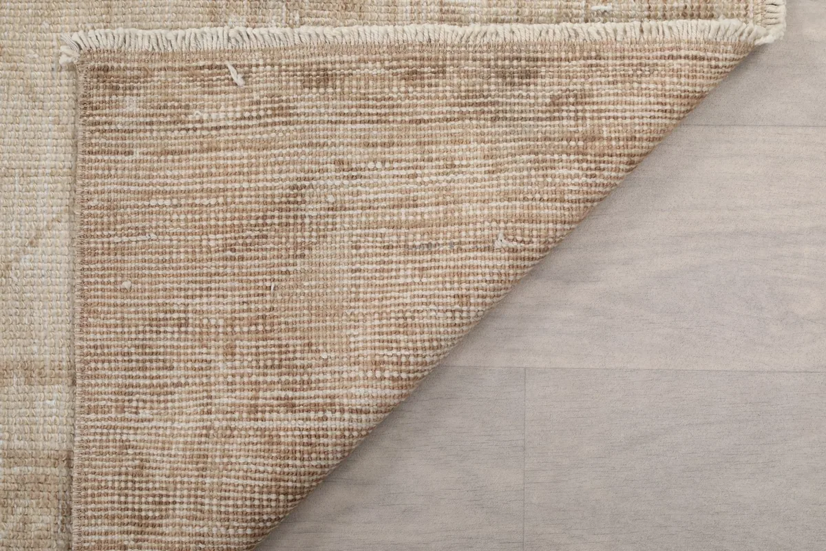 Reverse side of the runner rug, showing the consistent knotting and wool on cotton foundation.