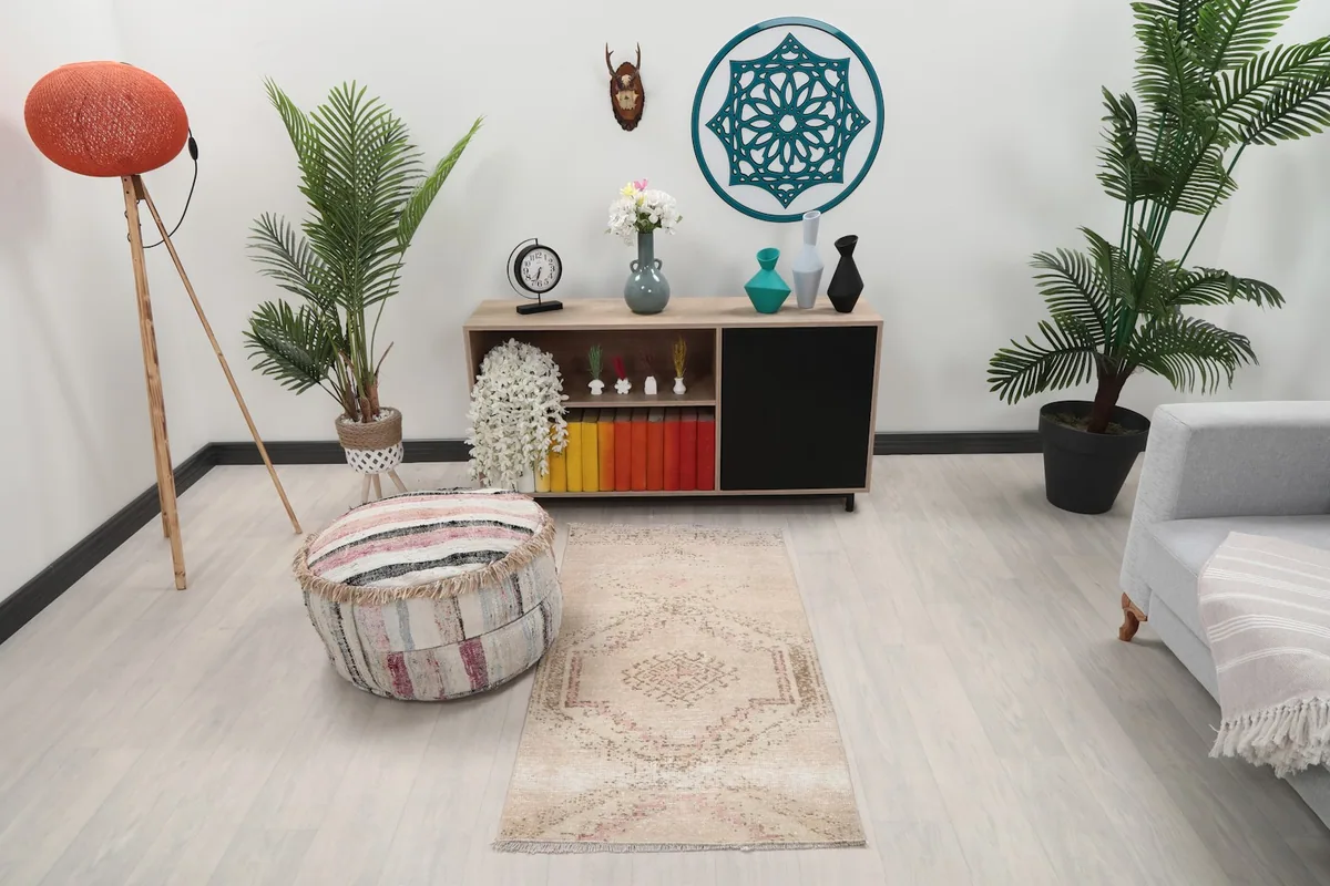 Vintage mini rug displayed in a living room setting with modern furniture