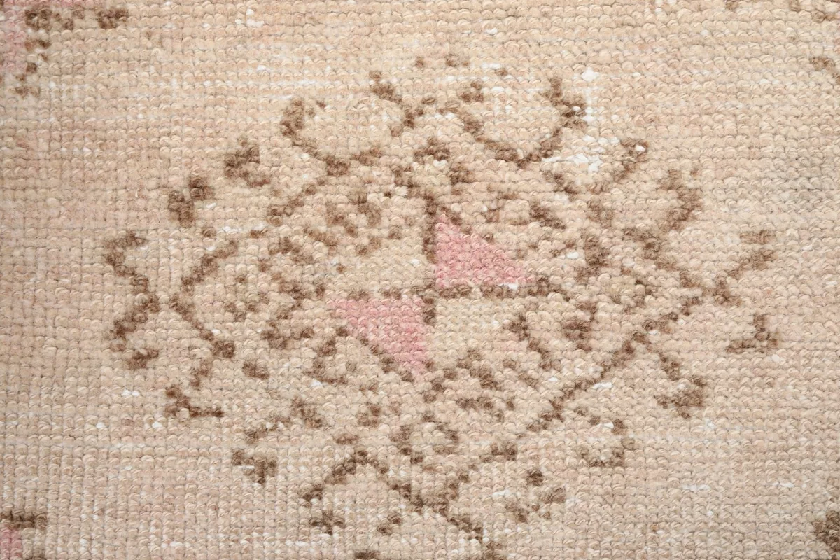 Detailed view of the intricate tribal pattern within the central medallion