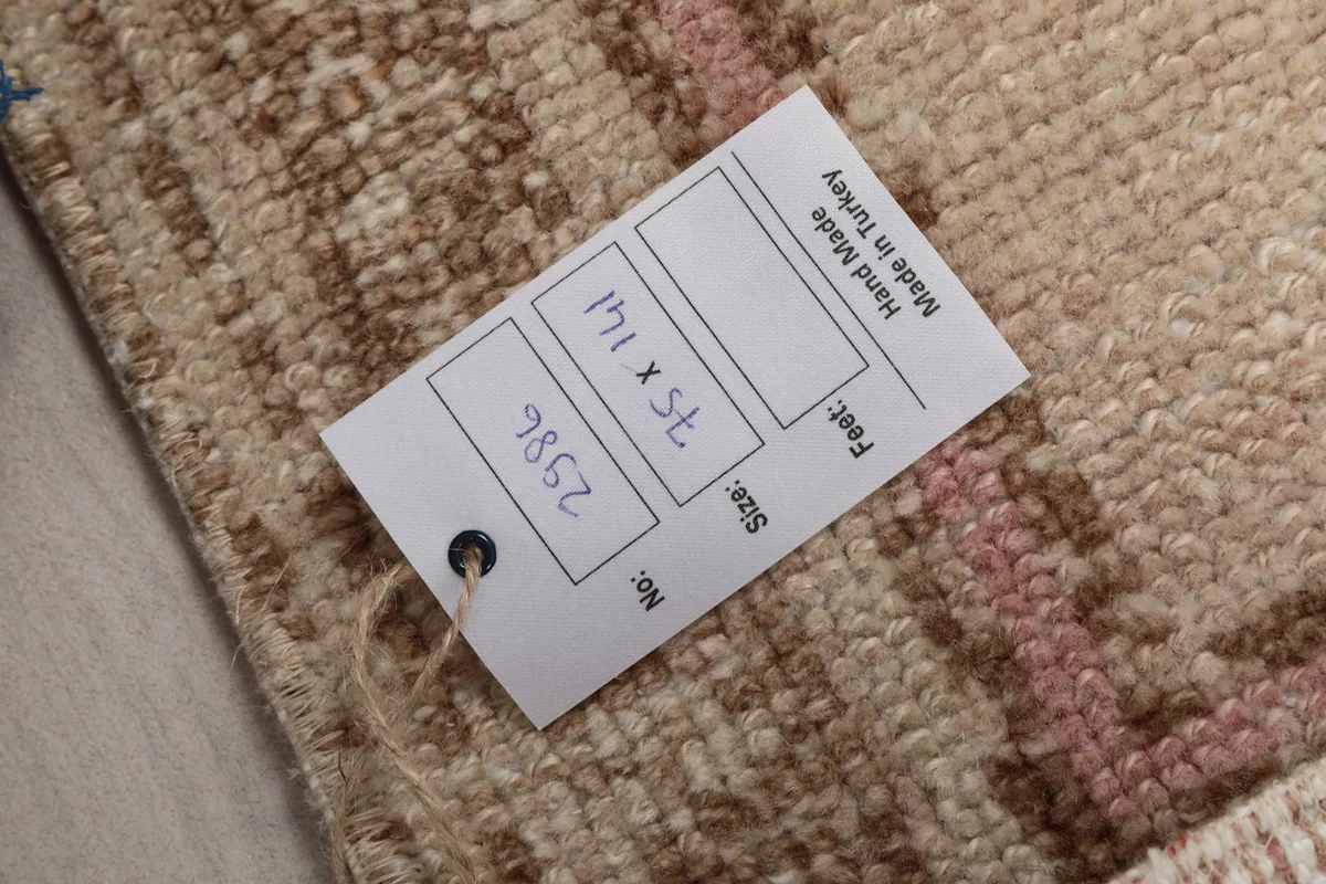 Product tag on the rug showing size and origin details